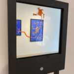 motion sensor mirror with interactive image that reads : 